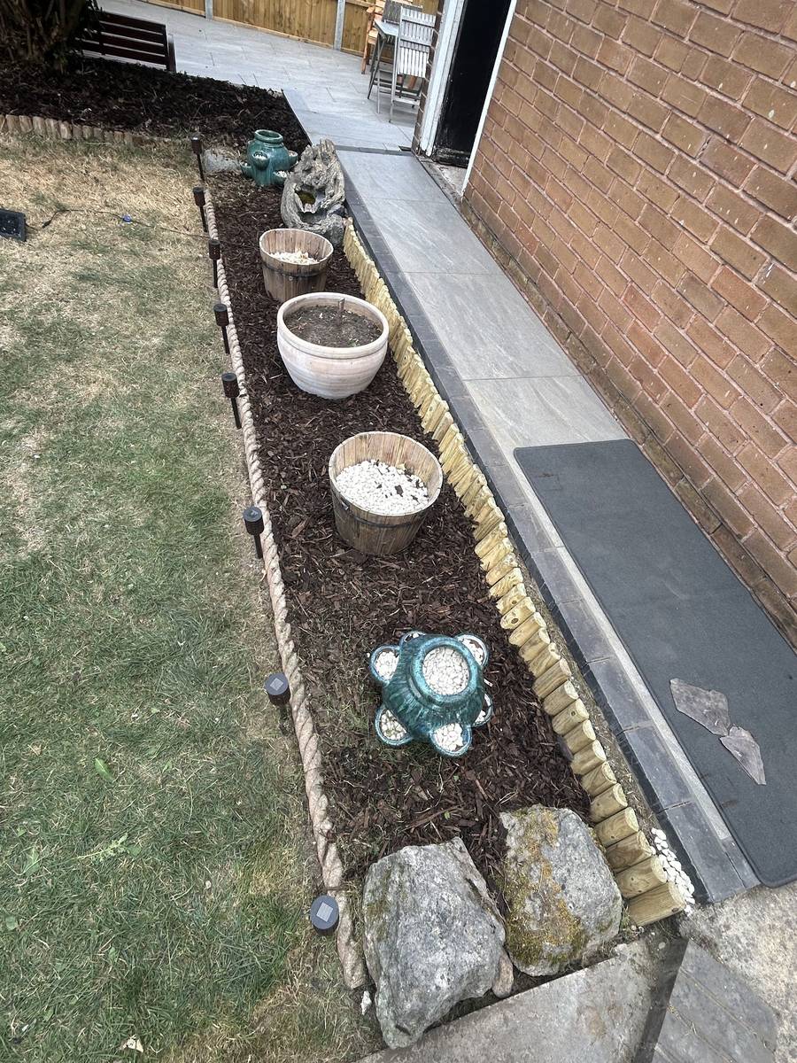A new border finished with decorative bark
